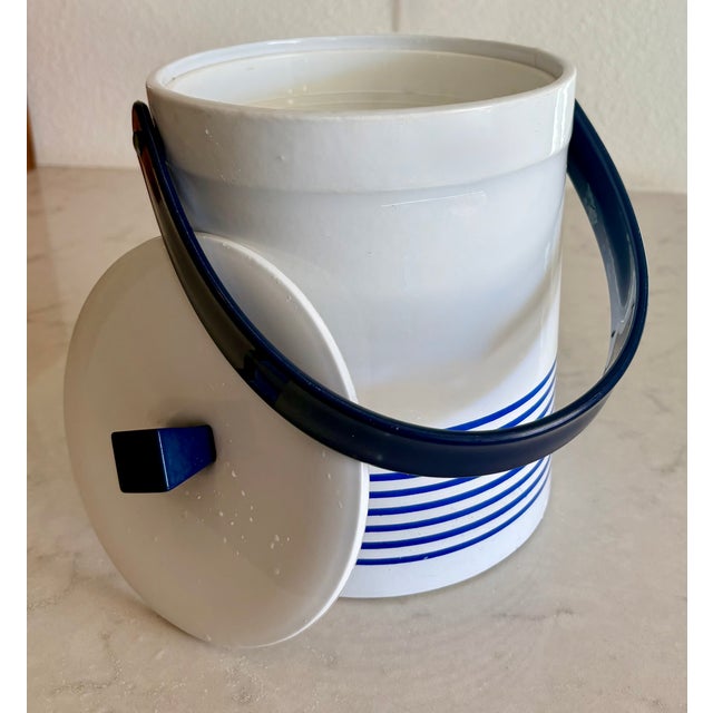 Make sure your cold beverages are shipshape even when not at sea! This vintage white vinyl ice bucket will make sure you...