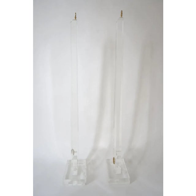 Vintage Maison Jansen Maison Charles Style Obelisks in Lucite and Brass - a Pair This large scale pair of Lucite obelisk...