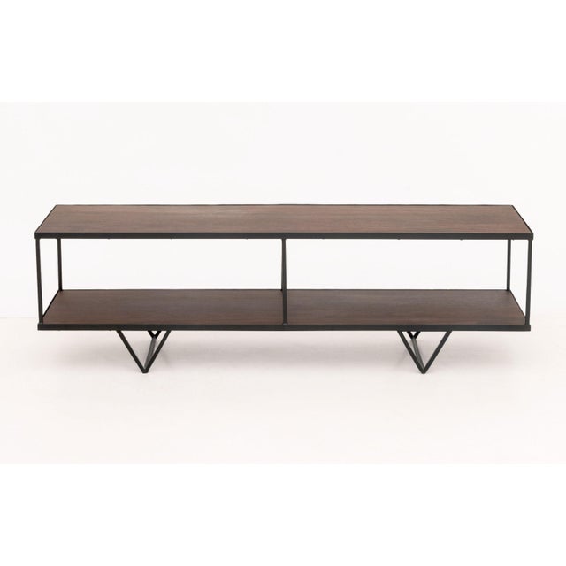 Geometric Design Walnut and Black Patinated Steel Two-Tier Coffee Table. 18" H x 59.25" W x 18" D. Provenance: From a...