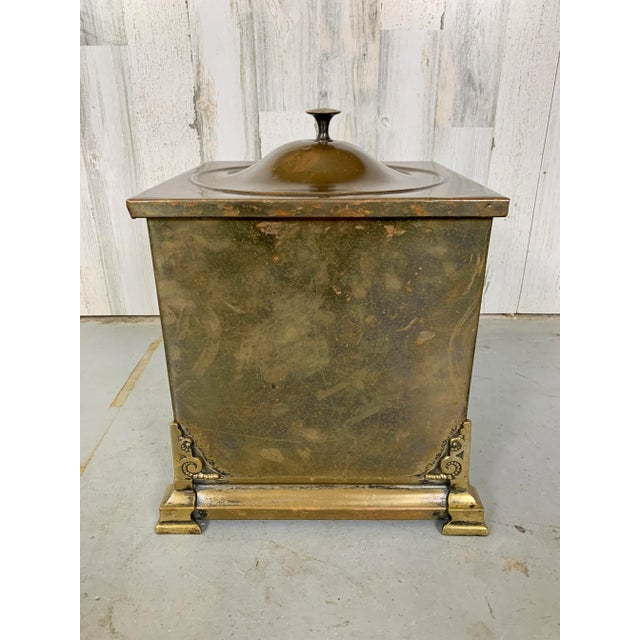 Decorative brass coal bucket with Zinc insert and Fleur De Lis handles Nice patina through out.