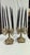Large brass finish candelabra pair, five holders each, heavy iron construction with pretty multi hue brass finish
