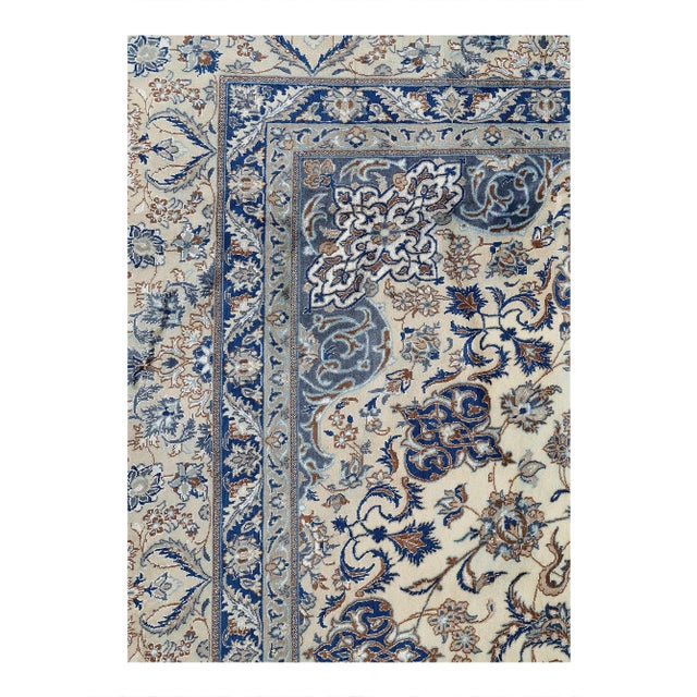 Nain rugs are renowned for their detail and fine use of outlining along the central motifs. Breaking from the classical...
