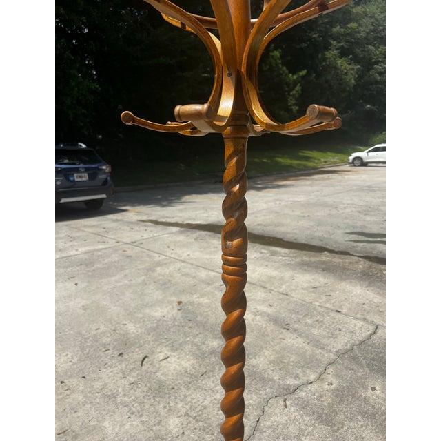 Up for consideration is a beautiful vintage blonde barley twist wooden coat/hat rack. This would look lovely in your home,...