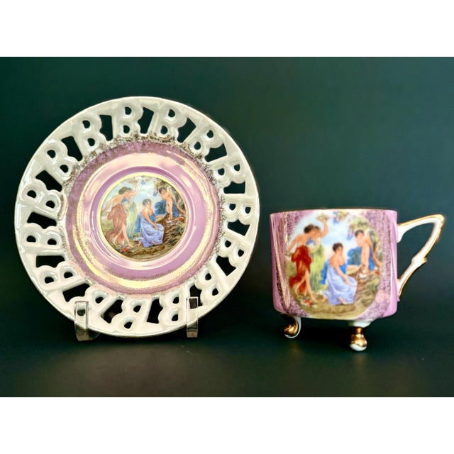 Rare vintage Royal Halsey teacup and saucer. Featuring a sculptural three-leg design and a one-of-a-kind handle, the...
