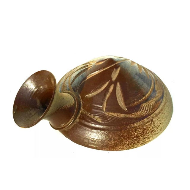 we have for your consideration a very beautiful mid century modern pottery. pottery consists of a beautiful color of brown...