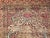 19th century Persian Kerman Lavar area rug in floral design in ivory, red, and blue colors. This beautiful Kerman Lavar...