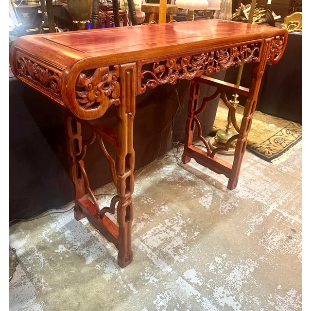 The Vintage Chinese Rosewood Dragon Altar Table/Entry Console is a stunning piece of furniture that exudes elegance and...