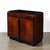 This striking Art Deco Machine Age cabinet, crafted in America, circa 1935, is a superb example of the era's bold and...