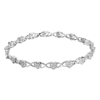 .925 Sterling Silver Diamond Accent Heart Link Bracelet (I-J Color, I3 Clarity) - 7.25" For Sale