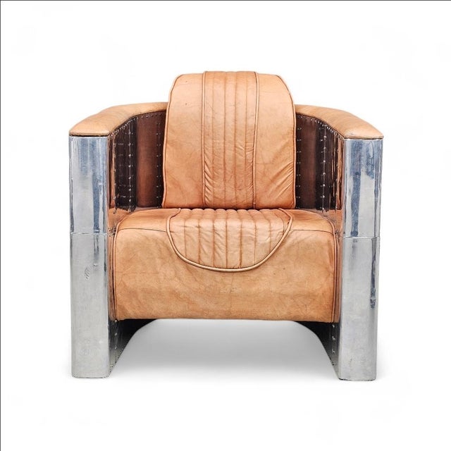 Beautiful Aviator Club Chair in Brown Distressed leather. A very rare model featuring an extra back column in the rear of...