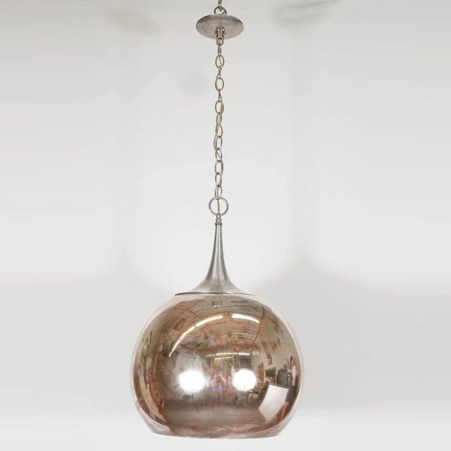 Space-age mercury glass bulb form pendant. Creator: Marcelo Bessa Manufacturer: Spark Interior Origin: United States...