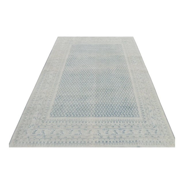 Hand-knotted wool, originating from Turkey circa 1970-1980, this 6x9 vintage Turkish rug is from the same provenance,...