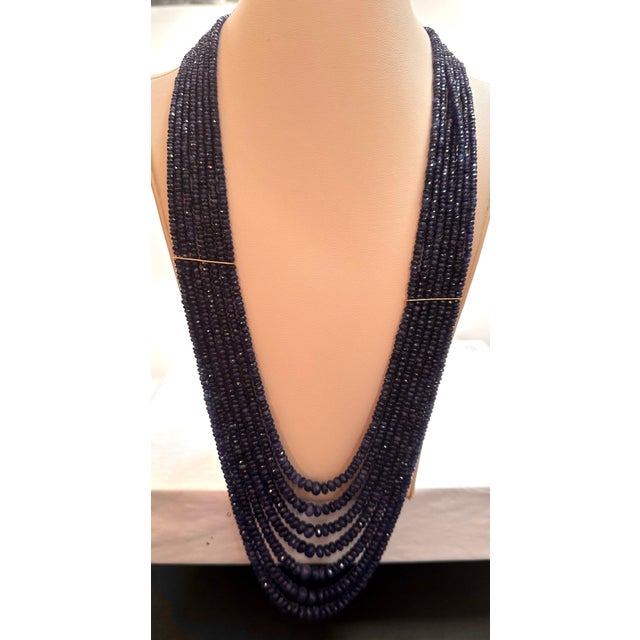 Approximately 760 Carat Natural very fine Sapphire Bead Seven Strand Necklace with Spacers in 14 Karat yellow Gold All...