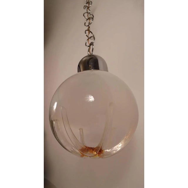 Art glass ball shade, with original chrome hardware, chain and canopy. Soft white on top, to clear middle, with tea...