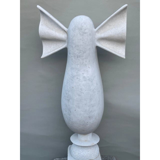 Nike hand carved marble sculpture by tom von kaenel. Dimensions: d 20 x w 22 x h 74 cm. Materials: marble. Tom von kaenel,...