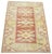Hand-knotted with care using traditional rug-making techniques, this wool rug blends timeless craftsmanship with a modern...