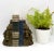 Stunning pair of bookends in the shape of either side of a fabric tassel. Made of resin and painted bronze with felt...