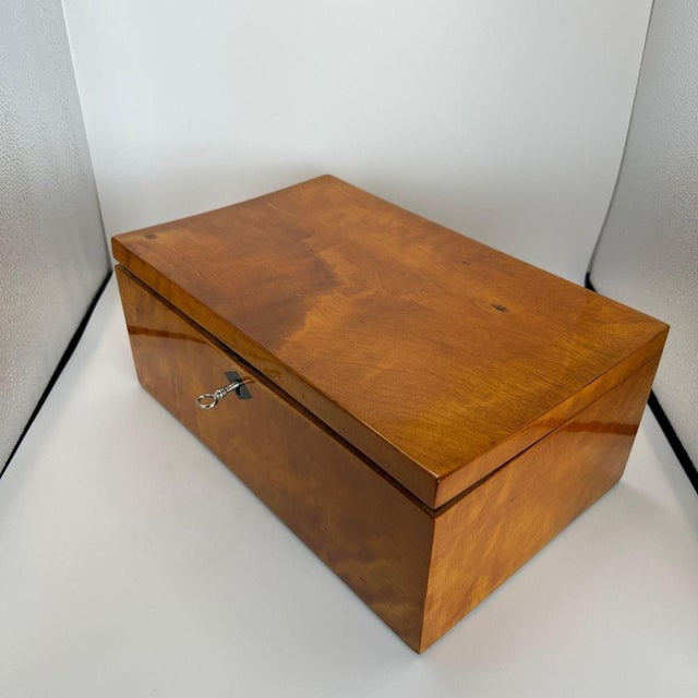 Beautiful, unadorned late Biedermeier casket box made of solid birch wood from northern Germany, circa 1840. Ebonized...
