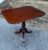 Great little 19th century English Regency tilt top mahogany side table with string inlaid top, ebony inlaid legs and paw...