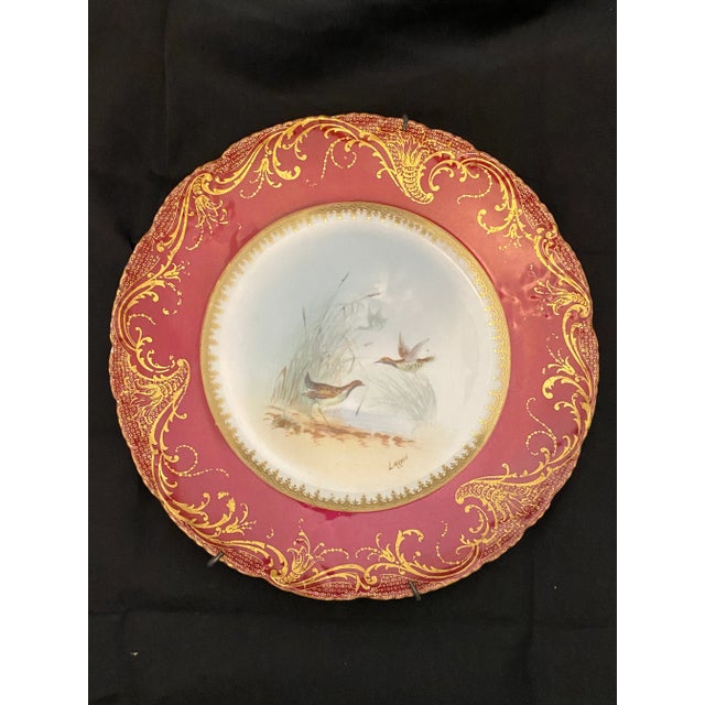 Antique Theodore Haviland Limoges cabinet plates, made in France circa 1894 to 1903. Each of the four plates features a...