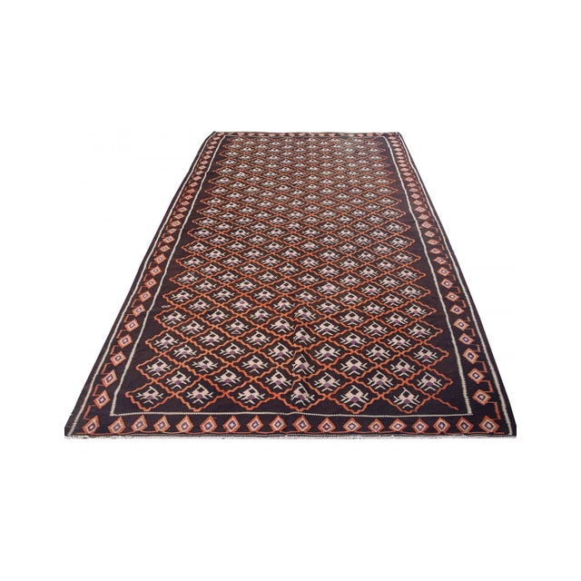 Vintage handwoven decorative kilim rug from Kars region of Turkey. Approximately 50-60 years old. In very good condition.