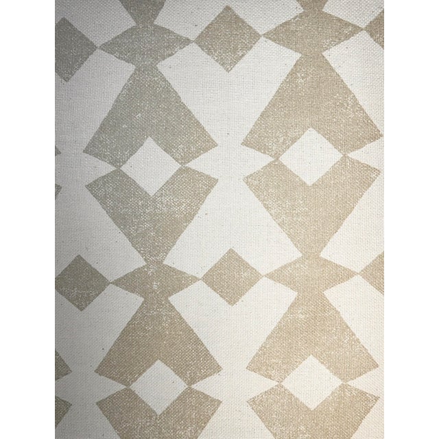 A tribal inspired geometric design in gold and screen printed on a heavy Indian Matka silk ground. The design reveals two...