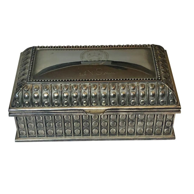 A beautiful silver plate box from the 1960s to early 70s. Fabulous design with a Department of the Treasury seal and a...