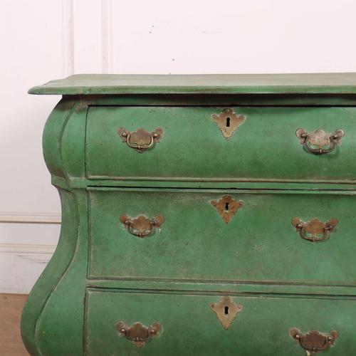 Samll early 19th C Dutch painted bombe commode. 1820 This piece is designed in the style of the selected designer and/or...