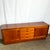 This Mid-Century Modern Teak Credenza is a timeless blend of form and function. Crafted from warm, richly grained teak, it...