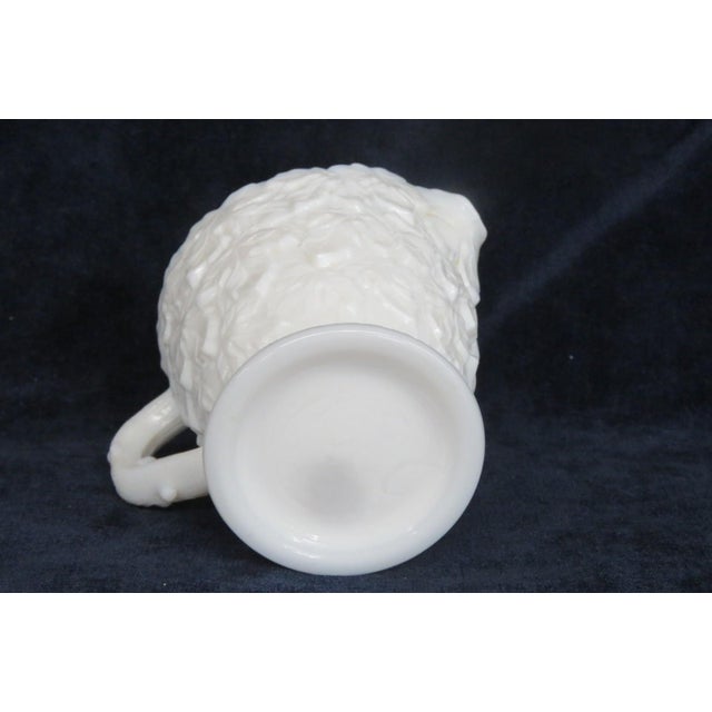 This adorable Creamer / Small Pitcher is made of milk glass. This darling piece features a classic vintage silhouette with...
