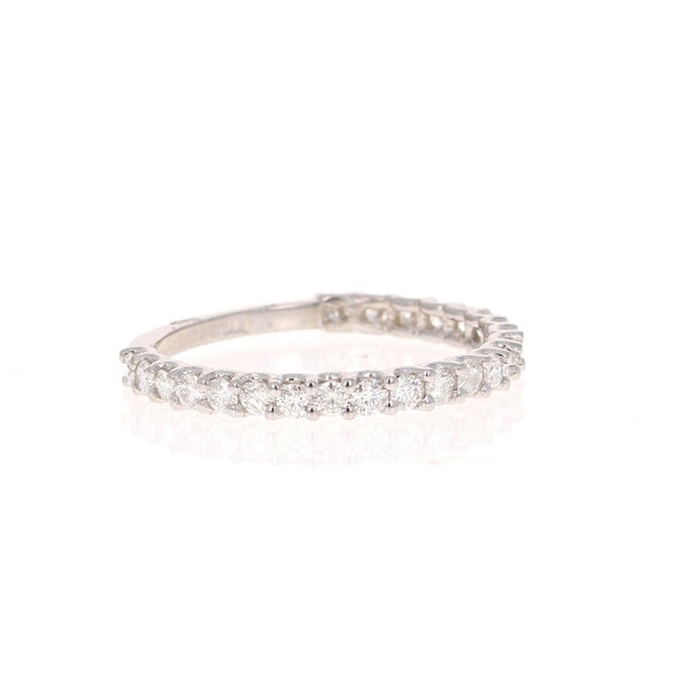 Cute and dainty 0.64 Carat Diamond band that is sure to be a great addition to anyone's accessory collection. There are 23...