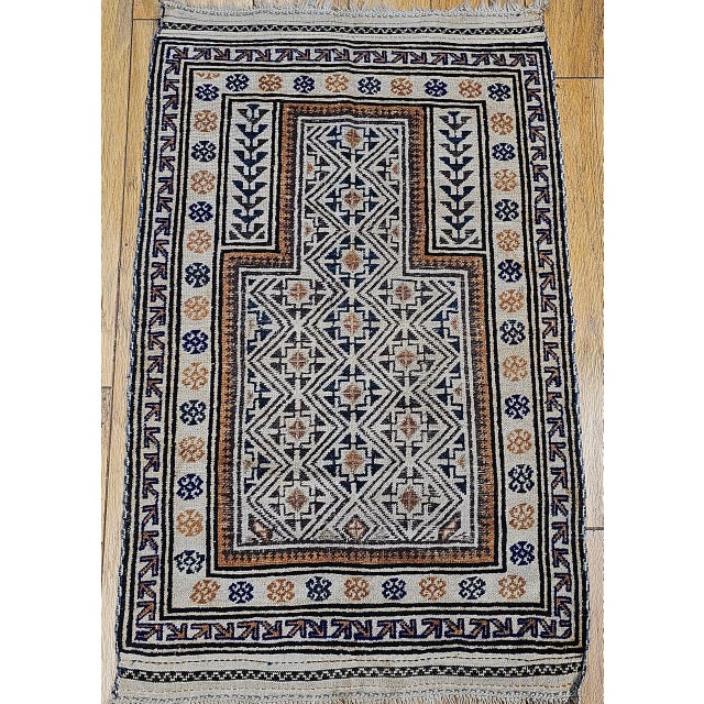 Tribal Early 20th Century Baluch Tribal Area Rug in a Prayer Pattern in Ivory, Brown, Navy Blue For Sale - Image 3 of 11