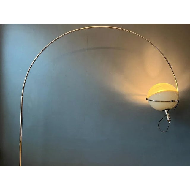 Increasingly rare 'Focus' eyeball space age floor lamp by Fabio Lenci for Guzzini. The moon-like acrylic glass shade...