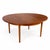 A classic Danish round extending dining table, designed with clean lines and understated elegance. The extension mechanism...