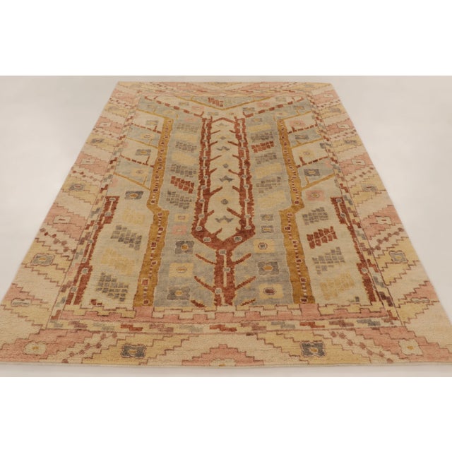 This modern 6x9 Oushak rug from Rug & Kilim is a sophisticated reinterpretation of classical Anatolian design traditions....