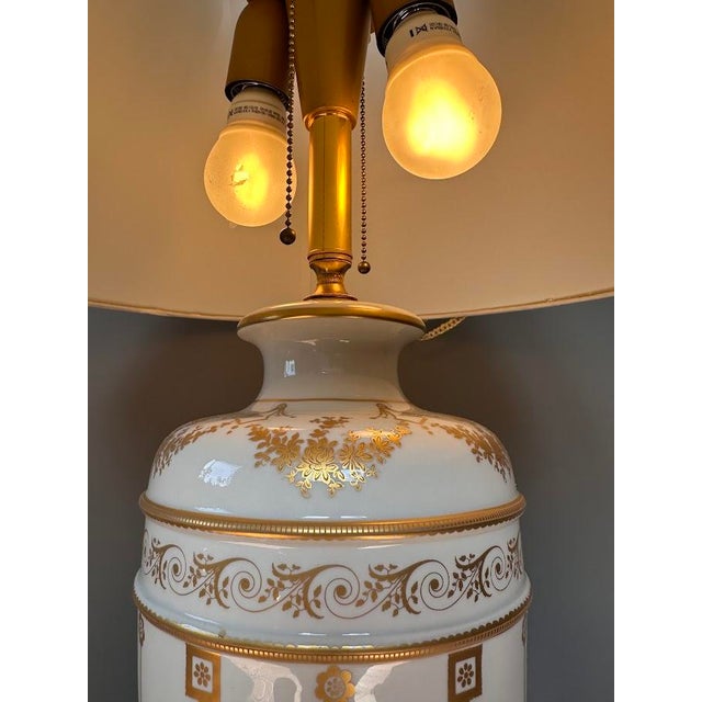An elegant, luxurious Italian table lamp signed by Giulia Mangani, crafted from premium Florentine porcelain and decorated...