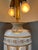 An elegant, luxurious Italian table lamp signed by Giulia Mangani, crafted from premium Florentine porcelain and decorated...