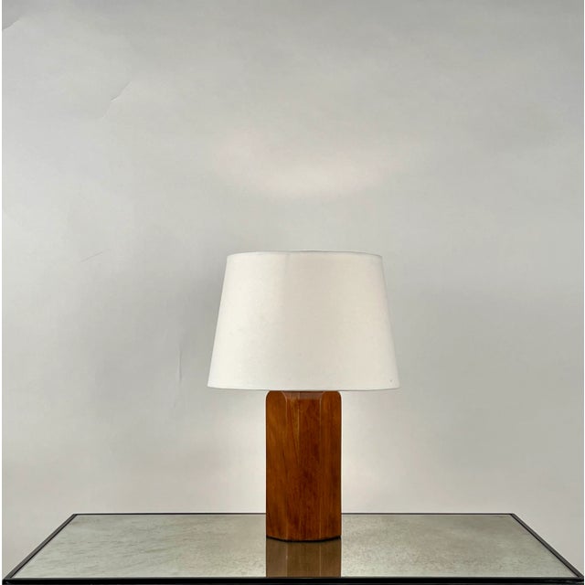 'Octogone' walnut table lamp with parchment shade by DESIGN FRÈRES®. Attractive, understated combination of a polished...