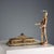 Elongated rectangular inkwell in gilded and carved bronze. Decorated with scrolls, plant motifs, and masks. A double...