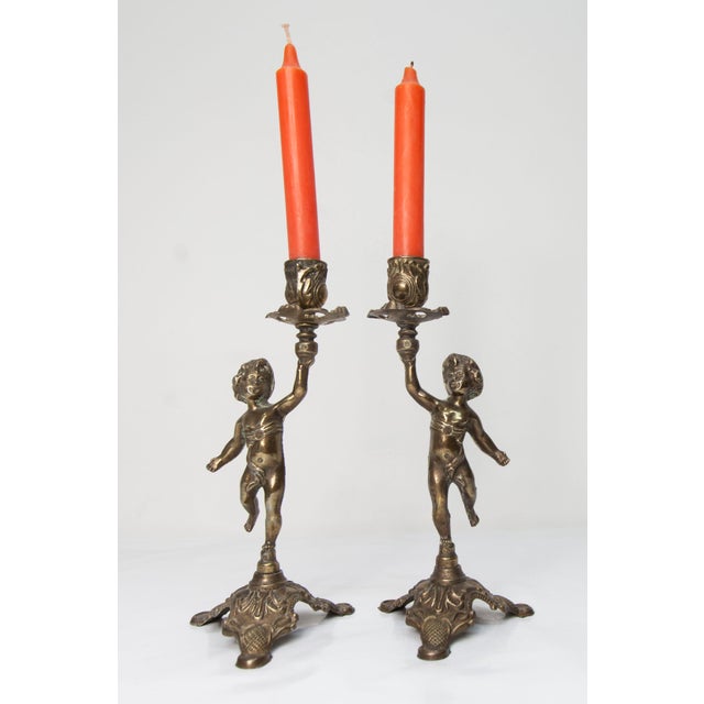 Pair of cherub candlesticks signed FC in very good condition. This piece has an attribution mark, I am sure that it is...