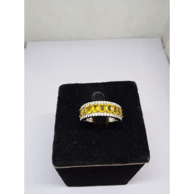 Gemstone details Gold Purity: 14K Solid Gold Yellow sapphire: 3.30 cts Diamond: 0.75 cts 14K gold Net weight: 2.37 grams...