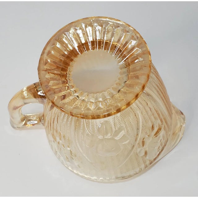 Pattern: Iris Iridescent Color: Flora Gold Manufacturer: Jeanette Glass Company Date Produced: 1960s Shape: Creamer