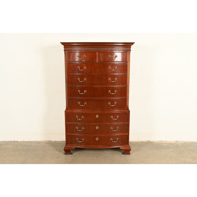A gorgeous Georgian or Chippendale style nine-drawer highboy dresser or chest of drawers By Baker Furniture USA, Circa...