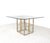 Vintage dining table from the 1970s, presumably of italian origin. this stylish table is characterized by a square brass...