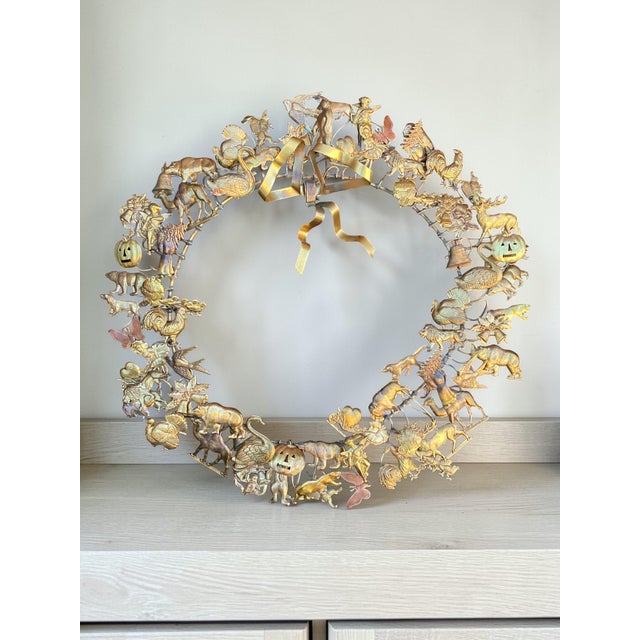 This is a beautiful vintage Petites Choses all-seasons brass wreath. It contains an extraordinary collection of figures -...