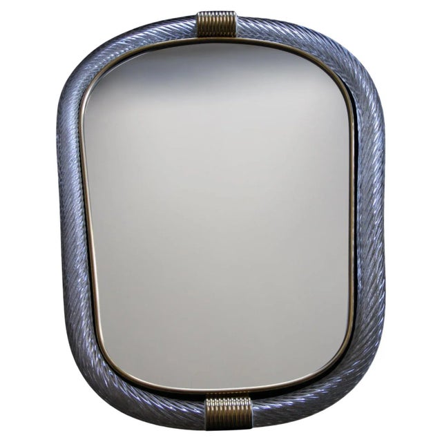 This beautiful vertical white mirror is purely in the tradition of Venetian glass making. The technique used to achieve...