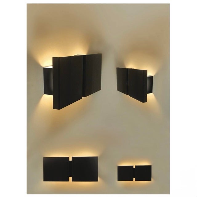 Designed in 1971 by renowned belgian designer christophe gevers, the square 2g wall lamp is a striking example of...