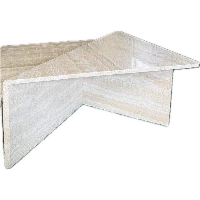 2 piece Italian modern/postmodern table made from Travertine. Unique design can be pulled apart and used as 2 separate...