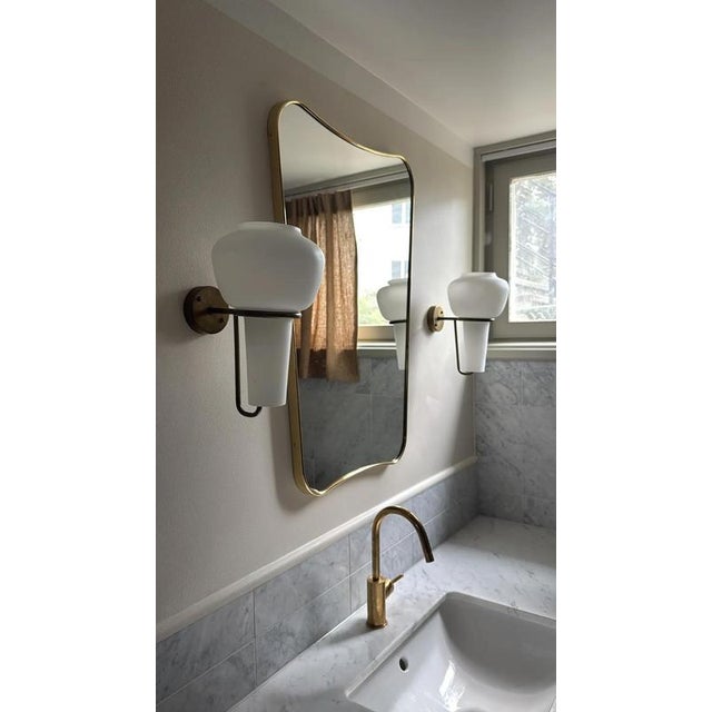 Exquisite pair of wall lights by Hans Agne Jakobsson for his Markaryd studio, crafted in Sweden circa 1960s. Elegant wall...