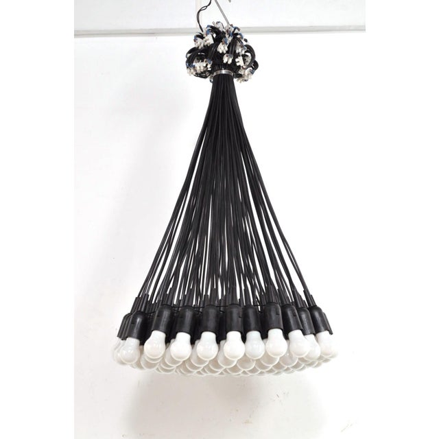 Dutch design minimalist design lamp designed by the dutchman rody graumans, 1992. the 85 black cords, sockets and bulbs...